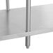 A Regency stainless steel shelf with metal legs.