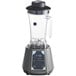 An AvaMix commercial blender with a black base and glass containers.