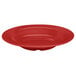 A red melamine bowl with a curved edge on a white background.