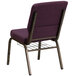 A purple church chair with metal legs.