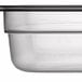 A Cambro translucent plastic food pan with lid.