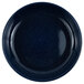 A navy blue Crow Canyon Home enamelware pasta plate with speckled surface.