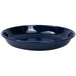 A navy speckled enamelware pasta plate with a black rim.