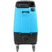 A blue and black Mytee Grand Prix automotive heated extractor machine.