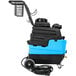 A blue and black Mytee Lite 8070 heated carpet extractor with wheels.