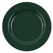 A Crow Canyon Home Stinson enamelware salad plate with a forest green speckled surface and wide rim.