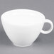 An Arcoroc white cup with a handle.