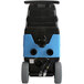 A black and blue Mytee Speedster Deluxe carpet extractor with wheels.