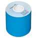 A roll of MAXStick blue linerless tape on a white surface.
