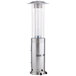 A stainless steel Backyard Pro portable patio heater with a round glass top.
