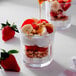 A glass of yogurt with strawberries and bananas served in an Arcoroc Double Old Fashioned Glass.