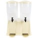 A Tablecraft beige plastic beverage dispenser with two plastic containers and black handles.