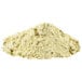A pile of Golden Dipt Clam Fry Breader mix powder on a white background.
