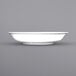 A white International Tableware porcelain soup bowl with a rolled edge.