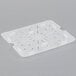 A white translucent polypropylene tray with holes.