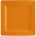 An orange square porcelain plate with a white rim.
