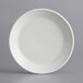 An International Tableware European white porcelain plate with a raised edge.