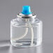 A clear bottle of Leola clear liquid wax with a blue cap.