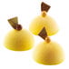 A group of yellow desserts made using the Silikomart mini half sphere baking mold.