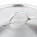 A stainless steel Vollrath Centurion pan cover with a silver handle.