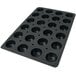 A black Silikomart muffin pan with 24 compartments.