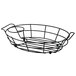 A black Vollrath oval wire basket with a handle.