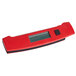 A red rectangular Taylor digital thermometer with a window and black buttons.