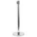 A chrome Aarco crowd control stanchion with a round metal base.