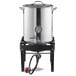 A Backyard Pro stainless steel brewing pot on a square outdoor stove stand.