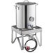 A Backyard Pro stainless steel brewing pot on a stand.