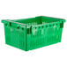 A green plastic agricultural crate with vented sides and metal handles.