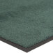 A green Lavex carpet mat with a black border.