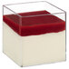 A Solia transparent square container with a red and white dessert inside.