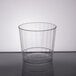 A WNA Comet Classicware clear plastic fluted tumbler on a table.