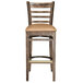 A Lancaster Table & Seating wood ladder back bar stool with light brown vinyl seat.