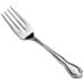 An Acopa stainless steel salad/dessert fork with a long silver handle.