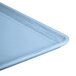 A close-up of a Robin Egg Blue Cambro dietary tray on a white surface.