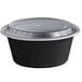 A black Choice plastic microwavable container with a clear plastic lid.