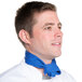 A man wearing a royal blue chef neckerchief.