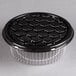 A black plastic D&W Fine Pack cake display container with a clear lid.