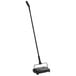 A black and silver Choice floor sweeper with a long pole.