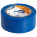 A roll of Shurtape blue line set tape.