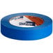 A roll of Shurtape blue masking tape.