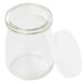 A clear glass jar with a plastic lid.