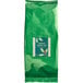 A green bag of Bossen Jasmine Green Loose Leaf Tea with a green label.