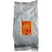 A white bag of Bossen Oolong Green Loose Leaf Tea with an orange label.