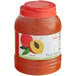 A jar of Bossen Peach Fruit Jam with a label.
