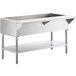 A stainless steel ServIt cold food table with an undershelf.