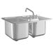A Regency stainless steel two compartment drop-in sink with a faucet.