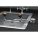 A stainless steel Guardian Equipment deck mounted eyewash station with two orange handles.
